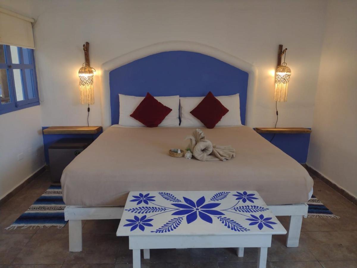 Mio Tulum Hotel Boutique Екстериор снимка A bedroom in a hotel in Santorini, Greece